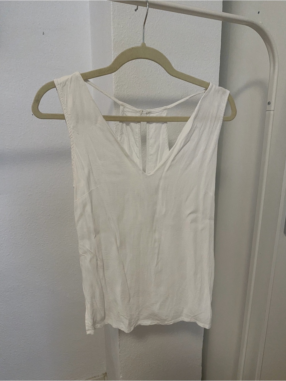 Sleeveless White V-Neck Women's Blouse